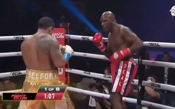 Evander Holyfield and Vitor Belfort in boxing match, sparking comparisons to Jake Paul vs. Mike Tyson.