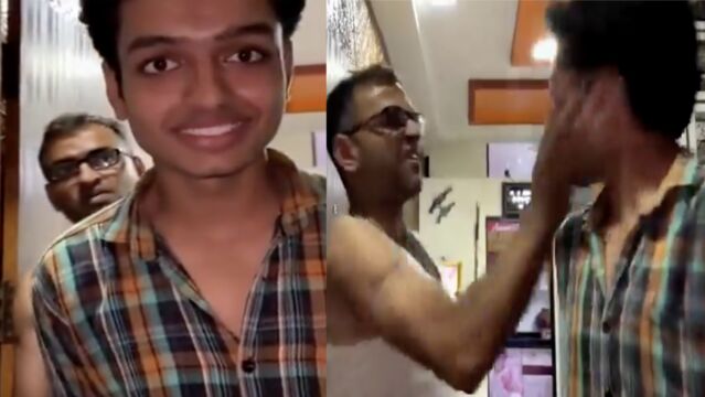 Indian father and son in cultural incident – son with clean-shaven face, father looking surprised